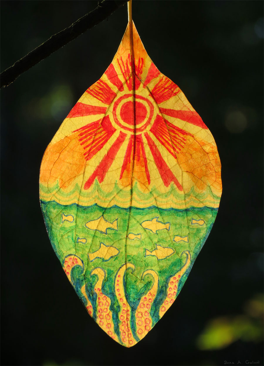 A radiant red-rayed sun rising over a green sea of fish and octopus tentacles, drawn on a backlit yellow leaf, by Sera Autumn