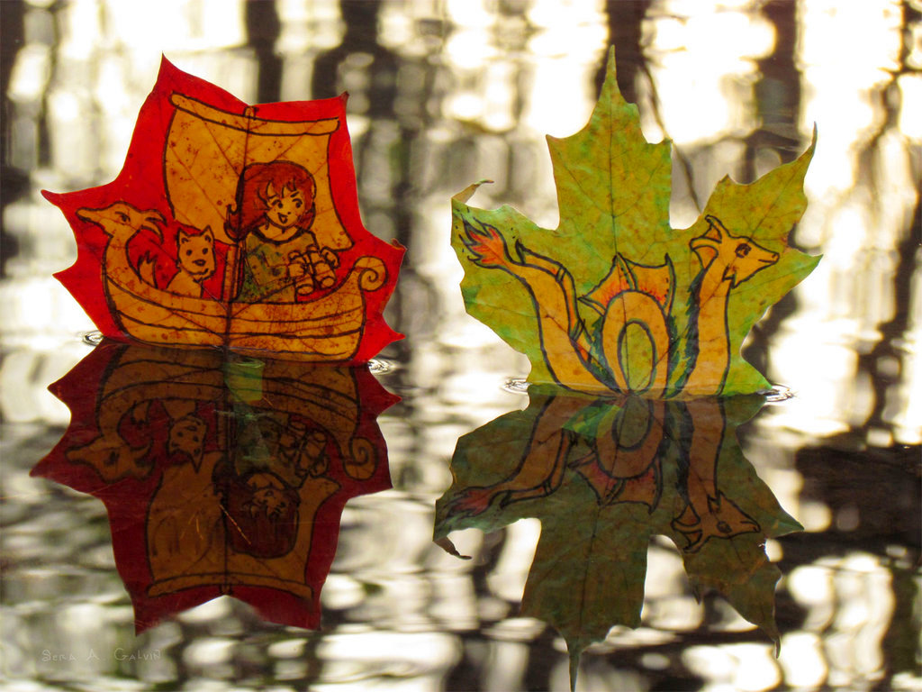 A red maple leaf with a drawing of a woman in a boat with a Viking prow following a green maple leaf with a drawing of a yellow Nessie, floating on shimmering water with reflections, by Sera Autumn