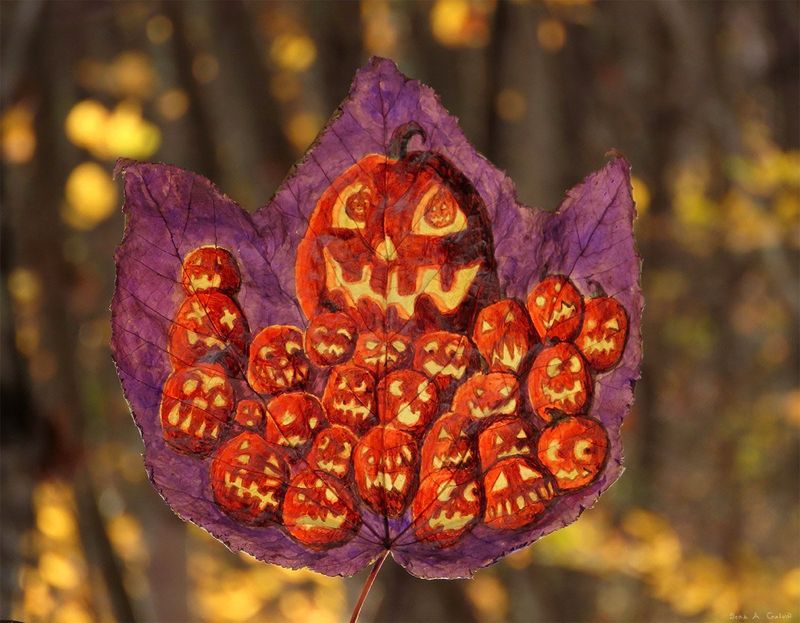 A cluster of grinning orange jack-o'-lanterns drawn on a purple striped maple leaf, backlit against golden autumn bokeh, by Sera Autumn