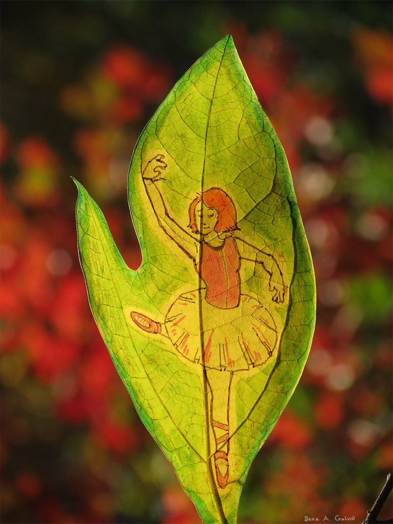 A red-haired ballerina in a tutu on pointe, drawn on a slender green leaf against blurred red autumn bokeh, by Sera Autumn