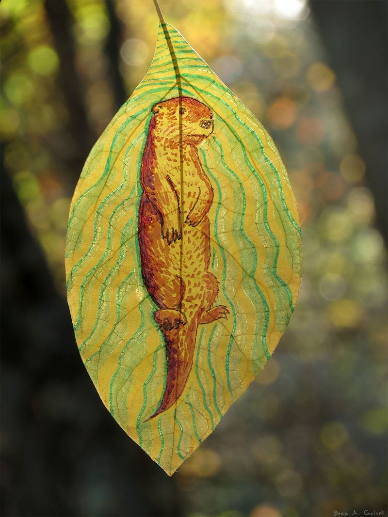 A brown river otter swimming upright among green wavy water currents on a translucent yellow skeleton leaf, backlit by glowing forest bokeh, by Sera Autumn