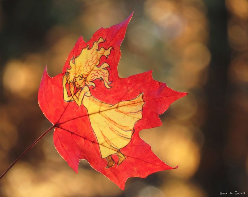A blonde woman in a flowing golden gown drawn on a vivid red maple leaf, against warm golden bokeh, by Sera Autumn